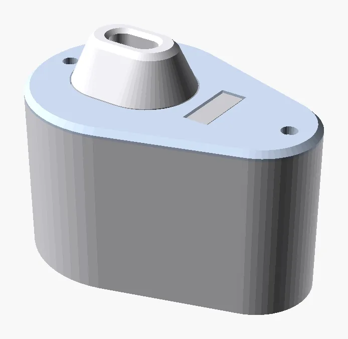 CAD render of the v0 puff tracker: a grey wedge-shaped housing with a raised oval mouthpiece on top.